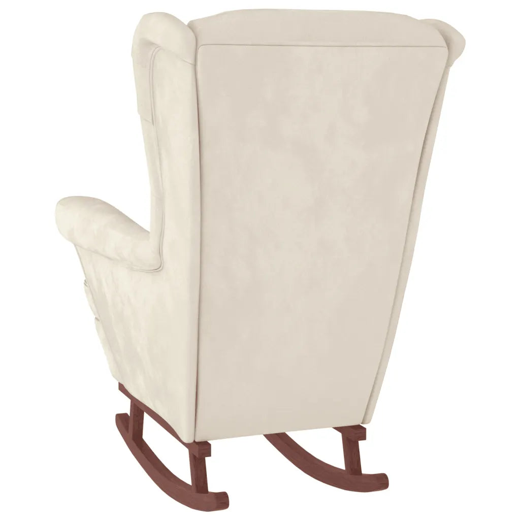 Un Fauteuil à Bascule de couleur Blanc Mouton. Pratique et confortable grâce notamment à son repose-pieds.