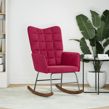 fauteuil à bascule rouge vin vu de face posé dans un salon