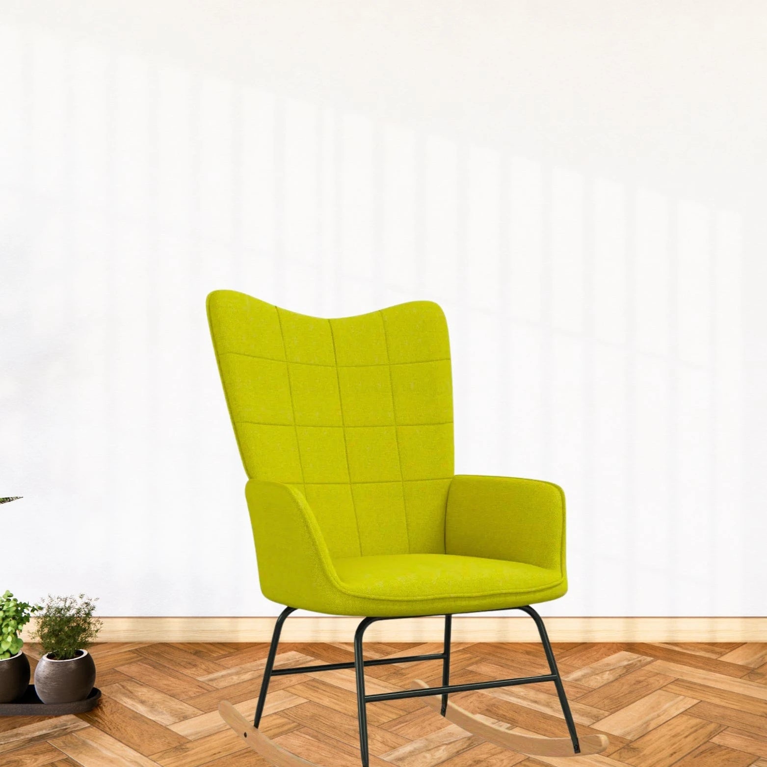 Un Fauteuil d'Allaitement vert au style Scandinave.