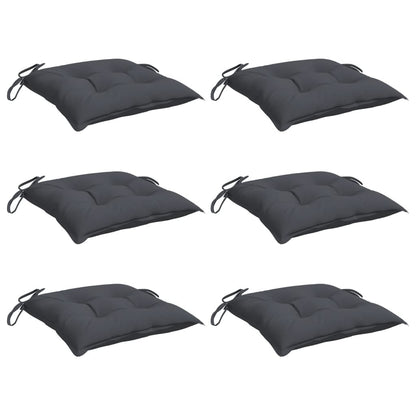 Les six coussins carrés anthracite avec leurs liens de fixation.