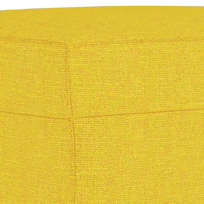 Repose-pieds jaune clair en tissu, détail du revêtement