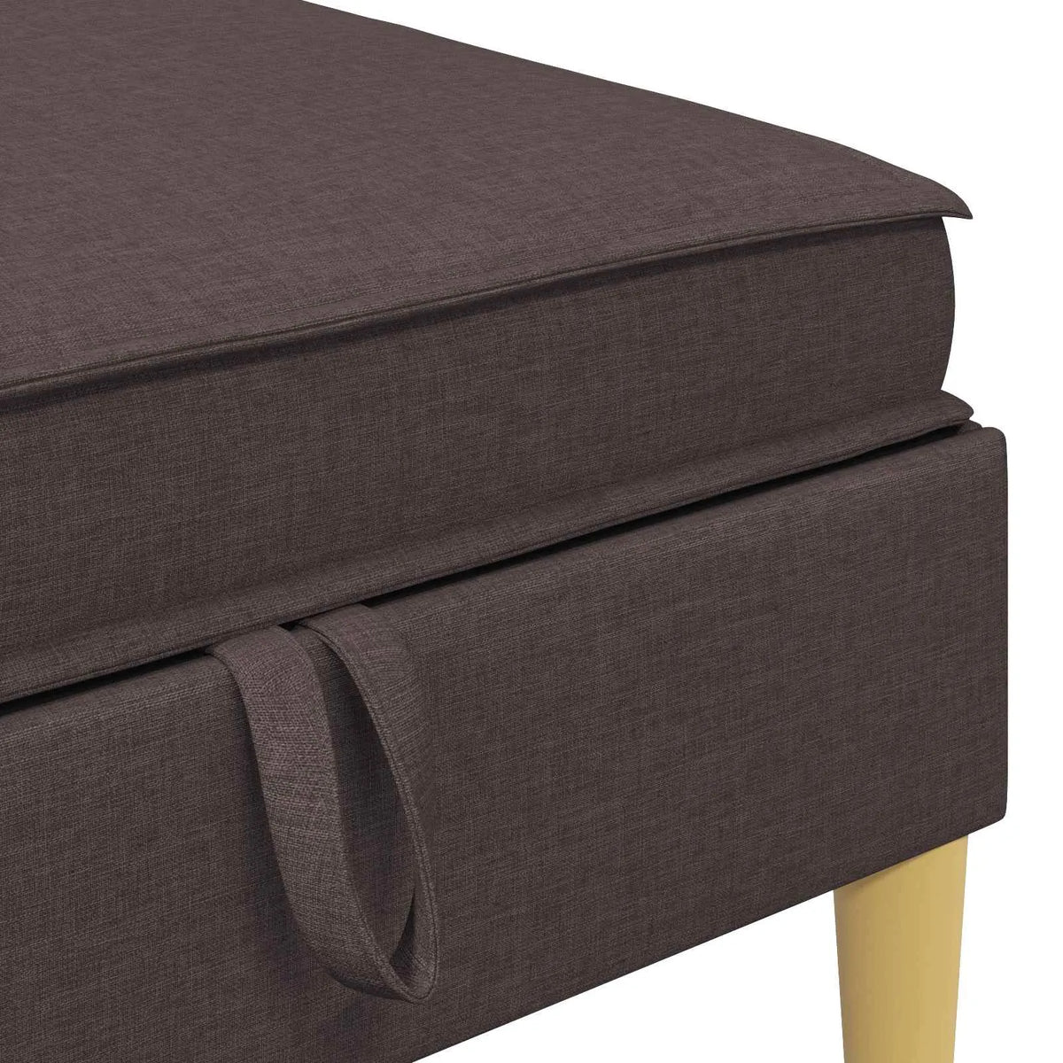 Détail de la languette et du couvercle du pouf marron