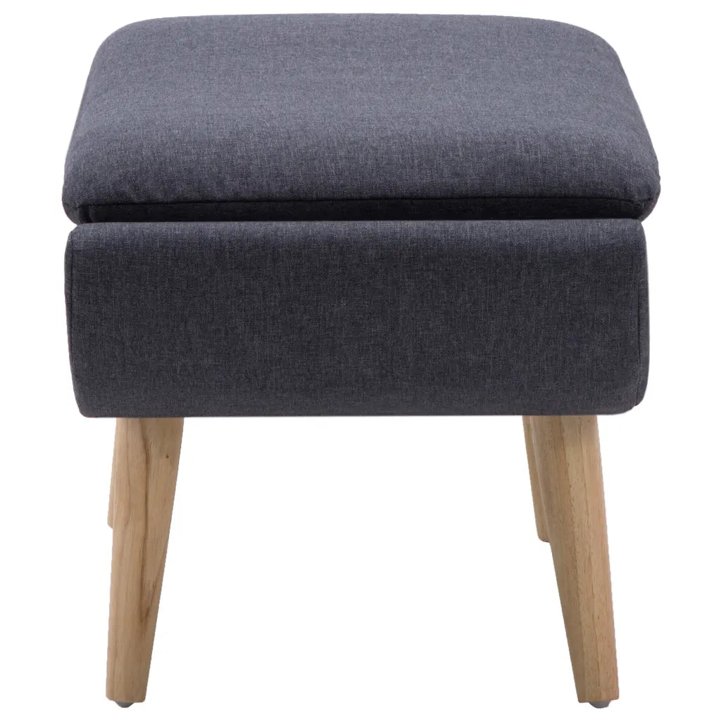 Un Tabouret Repose Pieds avec un revêtement tissu gris.