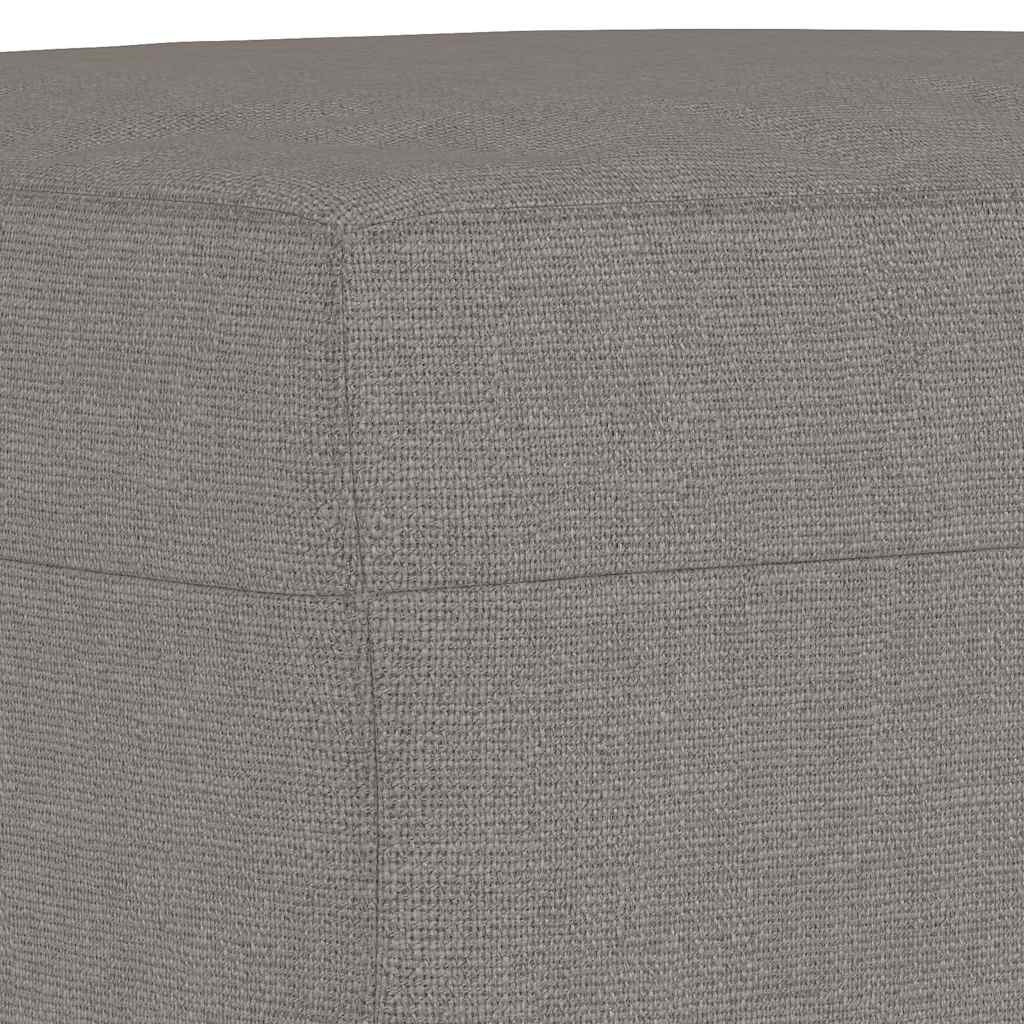 Repose-pieds taupe en tissu, détail du revêtement