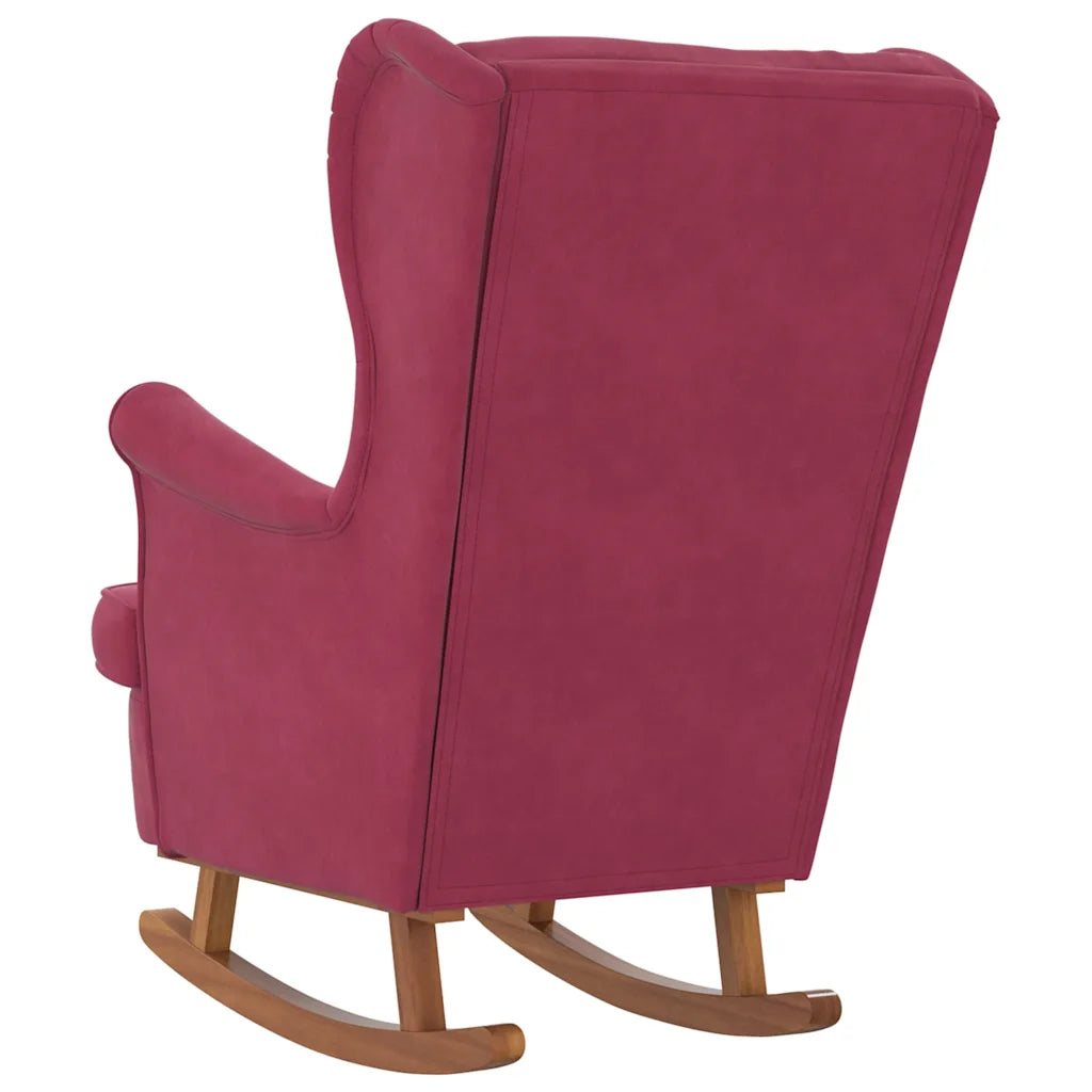 Vue arrière du rocking chair rouge vin, avec dossier en velours et patins en bois.