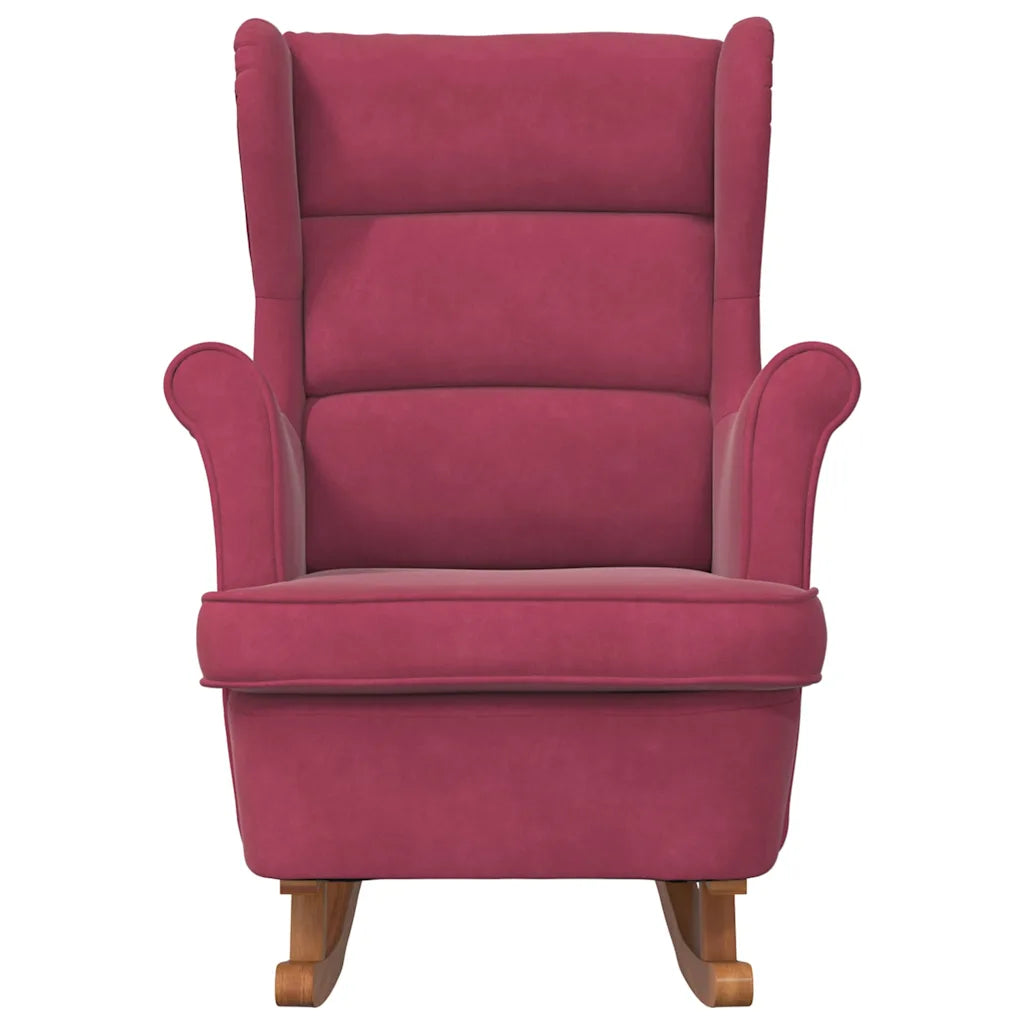 Vue de face du rocking chair rouge vin, avec dossier haut et accoudoirs rembourrés.
